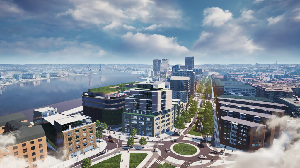 Ett grönt stråk i mitten omges av högre byggnader. Vid sidan av stråket löper Göta Älv. Göteborgsvarven skymtar i bakgrunden.